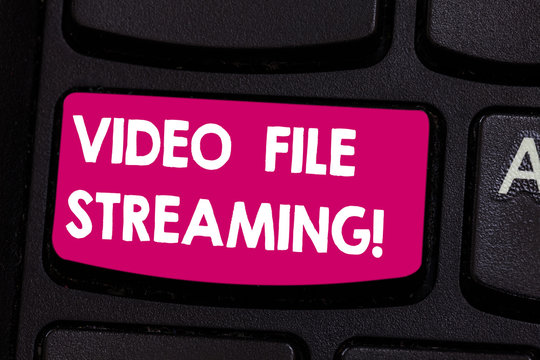 Text sign showing Video File Streaming. Conceptual photo video be viewed online without being downloaded Keyboard key Intention to create computer message pressing keypad idea