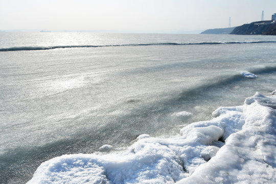 Russia. Vladivostok city, Patrokl Bay in winter, backlighting