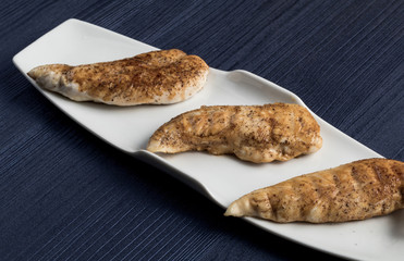 Traditional Spanish tapas dish. BBQ chicken, top view. Copyspace