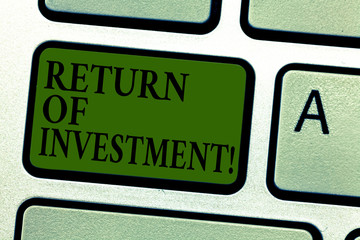 Handwriting text Return Of Investment. Concept meaning measures the gain or loss generated on an investment Keyboard key Intention to create computer message pressing keypad idea