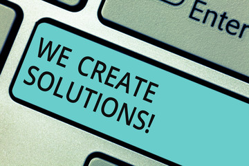 Obraz premium Writing note showing We Create Solutions. Business photo showcasing way to solve problem or deal with difficult situation Keyboard key Intention to create computer message pressing keypad idea
