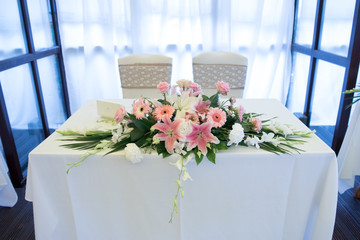 Wedding flowers at signing table 