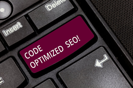 Writing note showing Code Optimized Seo. Business photo showcasing process of affecting visibility website in search engine Keyboard key Intention to create computer message pressing keypad idea