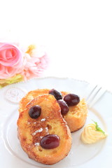 Obraz na płótnie Canvas Homemade honey French toast served with grape