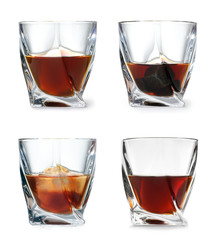 Set of glasses with expensive whiskey on white background