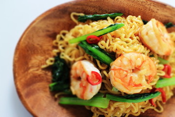 Chinese food, shrimp and green leaf vegetable fried noodles