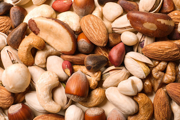 Organic mixed nuts as background, top view