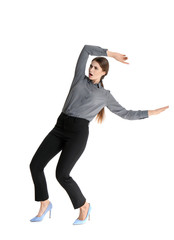 Young woman attracted to magnet on white background