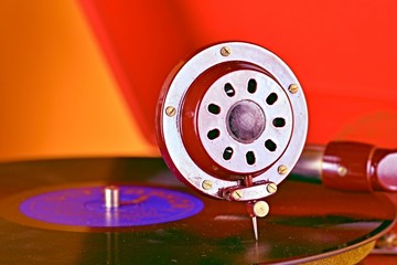 Old record player gramophone needle on record. Closeup