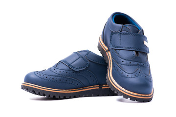 Blue baby shoes isolated on white background