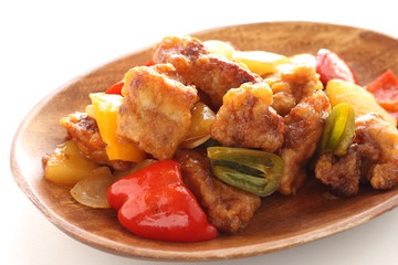 Chinese food, sweet and sour pork ribs with pinapple and pepper
