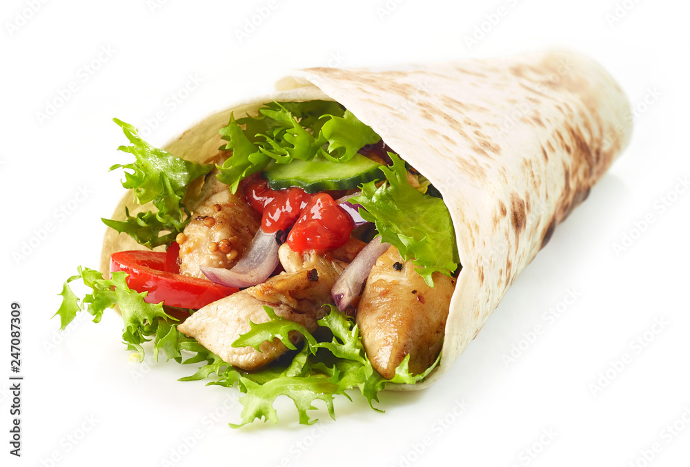 Wall mural Tortilla wrap with fried chicken meat and vegetables