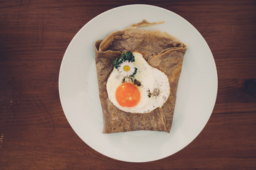 Delicious Crepe with a Sunny Side Up Fried Egg