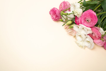 Pink and White floral border on cream color backgrounf flat lay