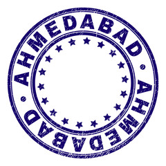 AHMEDABAD stamp seal watermark with distress texture. Designed with round shapes and stars. Blue vector rubber print of AHMEDABAD text with dirty texture.