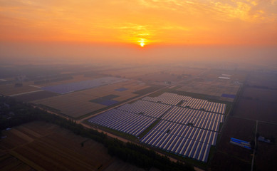 Solar photovoltaic roof panel in the sunset