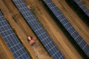 Aerial tractor when working under the solar photovoltaic panel