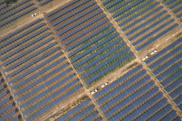 Aerial solar photovoltaic panels on the greenhouse of farmers