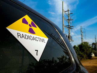 Radiation warning sign on the Dangerous goods transport label Class 7 at the transport truck