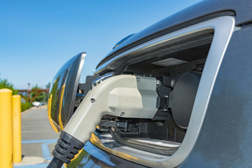 Electric plug connected to a vehicle for battery energy fulfil from charging station