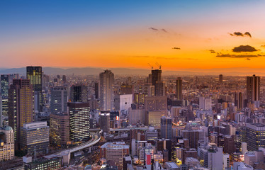 Sunset skyline over Umeda city aerial view, Osaka Japan night cityscape
