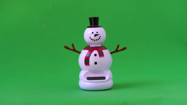 Funny Snowman dancing on green screen background,Merry Christmas and Happy New Year Concept.