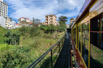 Sapa town viewing from tourist mountain tram, the transporation to Fansipan cable car station in Sapa town, Vietnam