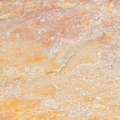 Yellow natural stone texture and background seamless