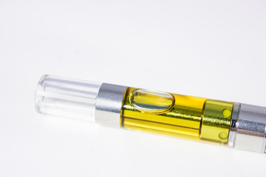 THC/CBD Oil Vape Pen Up Close Isolated On White Background
