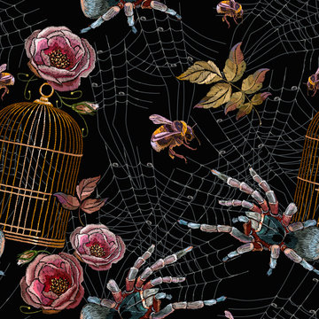 Embroidery spider, gold cage and wild roses seamless pattern. Classical gothic medieval halloween background. Horror art clothes template and t-shirt design