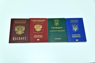 Russian passport, Russian international passport, Ukrainian passport and residence permit of Ukraine. on white background. Isolated