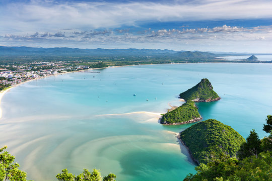 Beautiful blue sea and green island with city and beach at Prachuap bay in the west side of the Gulf of Siam, aerial view from the Khao Lom Muak, Unseen Thailand