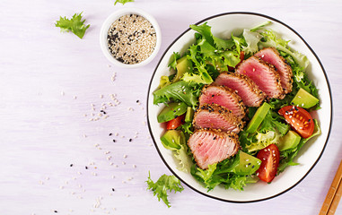 Tuna salad. Japanese traditional salad with pieces of medium-rare grilled Ahi tuna and sesame with...