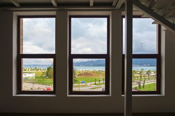 View of the seaside park through the windows