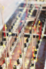 Incense candles at the point of worship.