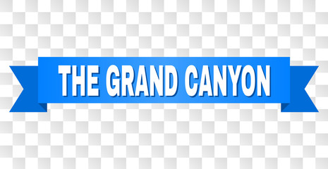 THE GRAND CANYON text on a ribbon. Designed with white title and blue stripe. Vector banner with THE GRAND CANYON tag on a transparent background.