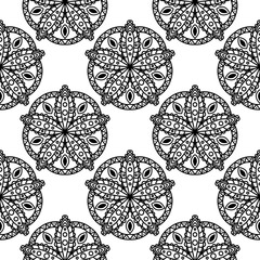 Black geometric ornamental design on white seamless background. Indian style