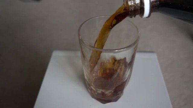 Pouring Cola Coke Root Beer Into Glass One Third Of The Way Super Slow Motion