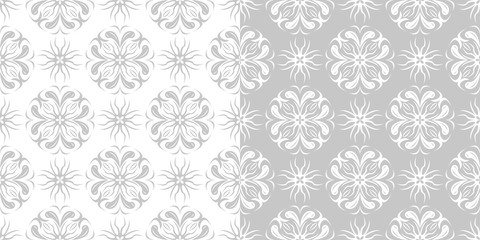 Compilation of gray and white floral patterns. Set of seamless backgrounds