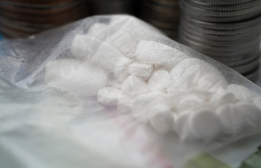 pills drugs pack on a blue background