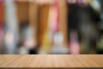 blank wood table with  blurred party outdoor background.