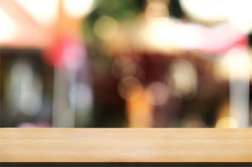 blank wood table with  blurred party outdoor background.