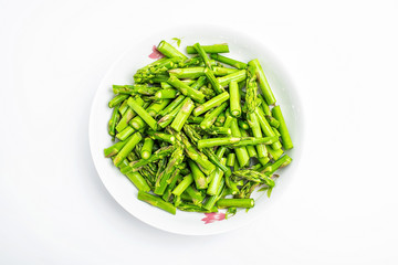 A dish of chopped asparagus