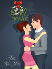 couple kissing under the mistletoe