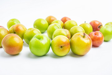 Fresh plums on white background