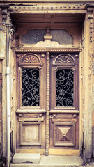 Old wood door with ornaments. 