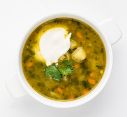 vegetable soup with sour cream, top view