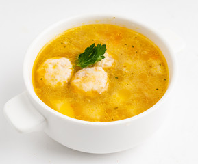 soup with meatballs in the white bowl