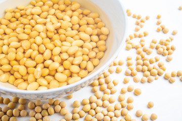 a bowl of soaked soy / wet soy beans