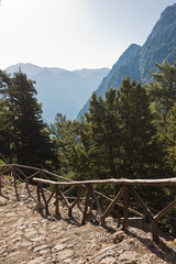 Entrance to Samaria gorge surrounded by very high mountains, south west part of Crete island, Greece